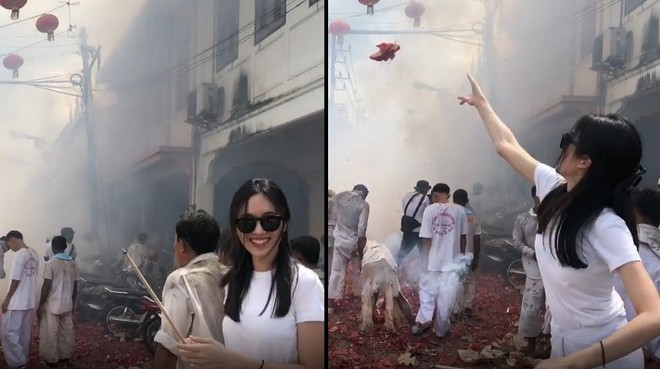 Người đẹp chuyển giới Nong Poy n&eacute;m ph&aacute;o v&agrave;o đ&aacute;m đ&ocirc;ng trong lễ hội, cư d&acirc;n mạng dậy s&oacute;ng tranh c&atilde;i - Ảnh 2.