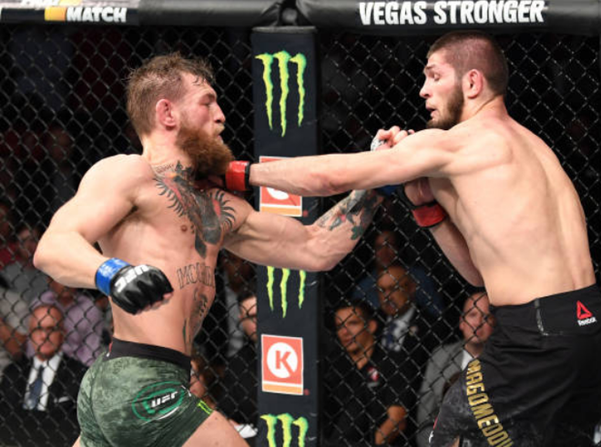 Gã điên McGregor thua đau trong lần tái xuất, tạo ra vụ ẩu đả chưa từng có trong lịch sử UFC - Ảnh 9.