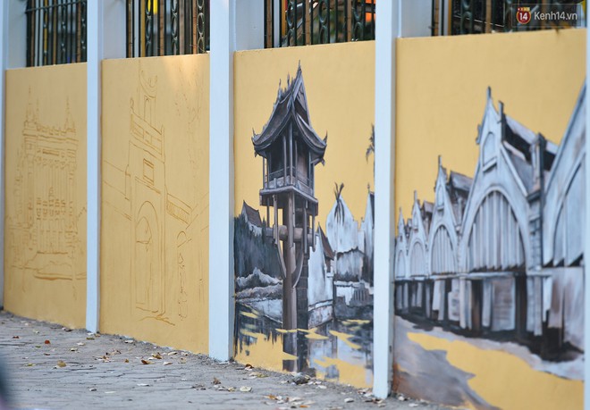 Dãy tường rào cũ kỹ trước cổng trường Phan Đình Phùng được khoác áo mới thành con đường bích họa siêu lãng mạn về Hà Nội xưa - Ảnh 10.