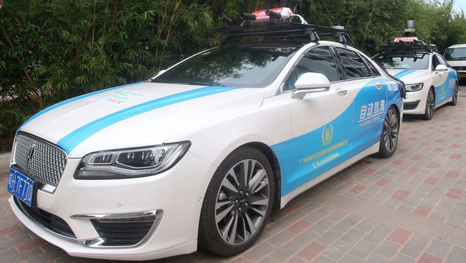 Trung Quốc chính thức triển khai dịch vụ taxi tự lái - Ảnh 1.
