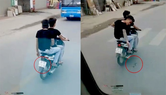 Truy tìm hai nam thanh niên đầu trần, lái xe máy rải đinh giữa đường phố Hà Nội - Ảnh 1.