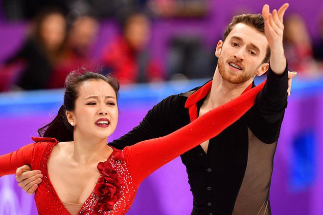 Nữ VĐV trượt băng nghệ thuật H&agrave;n Quốc gặp sự cố tuột khuy &aacute;o khi biểu diễn ở Olympic - Ảnh 3.