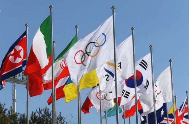 Hàn Quốc và Triều Tiên cùng nhau cầm cờ tại lễ khai mạc Thế vận hội mùa Đông Pyeongchang 2018 - Ảnh 2.