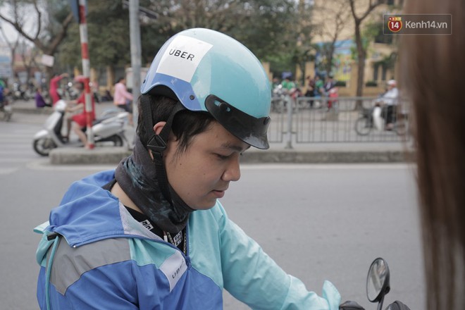T&agrave;i xế c&ugrave;ng h&agrave;nh kh&aacute;ch của Uber v&agrave; Grab phản ứng ra sao khi cả hai sẽ về chung một nh&agrave;? - Ảnh 5.
