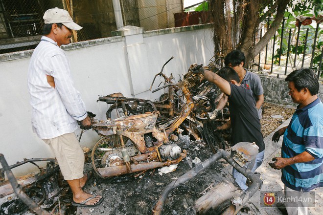 Hàng trăm xe máy, ô tô hạng sang bị cháy trơ khung tại chung cư Carina được kéo ra ngoài bán sắt vụn - Ảnh 16.