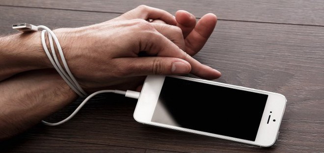 Apple sẽ cho ra đời 3 t&iacute;nh năng chống nghiện smartphone? - Ảnh 1.