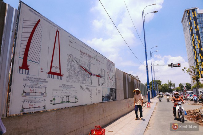 Chùm ảnh: Đường Tôn Đức Thắng trở nên lạ lẫm với người Sài Gòn sau khi hàng cây xanh biến mất hoàn toàn - Ảnh 5.