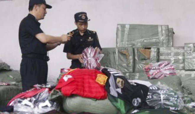 Trung Quốc: Bắt giữ hàng triệu món hàng nhái, hàng giả liên quan tới World Cup  - Ảnh 3.