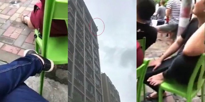 Trung Quốc: Đám đông mang ghế nhựa ra ngồi xem thanh niên định nhảy lầu tự tử suốt 3 giờ - Ảnh 1.