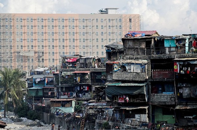 Ảnh: Cảnh tượng đau lòng trong những khu ổ chuột bị thiêu rụi ở Philippines - Ảnh 1.