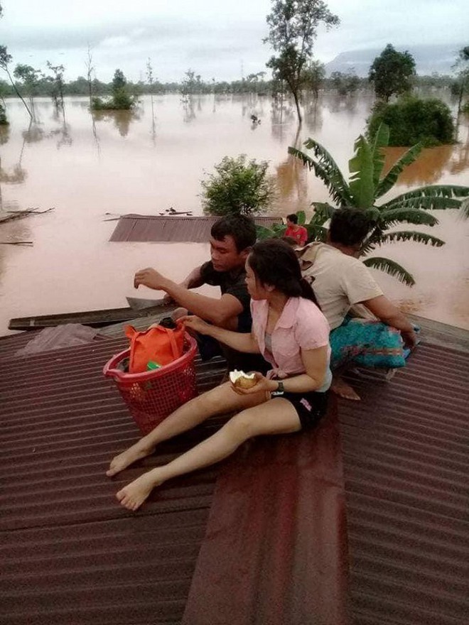 Thảm hoạ vỡ đập thuỷ điện ở Lào: Người Việt ở Attapeu ra sao? - Ảnh 6. Thảm hoạ vỡ đập thuỷ điện ở Lào: Người Việt ở Attapeu ra sao? - Ảnh 6.