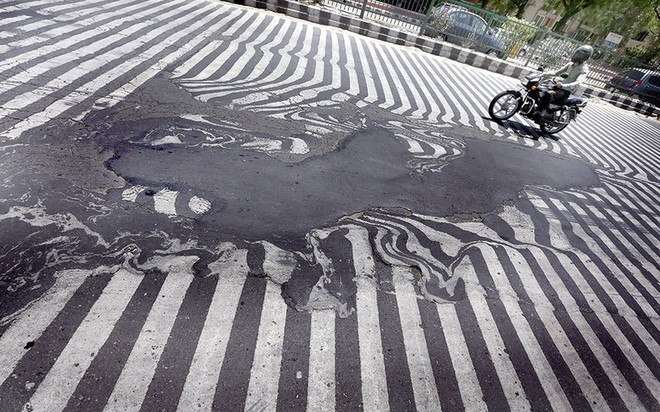 Đâu chỉ nước ta nóng trên 40 độ, thế giới cũng ghi nhận những đợt nắng nóng tới mức chảy lốp xe, chín cả trứng - Ảnh 10.