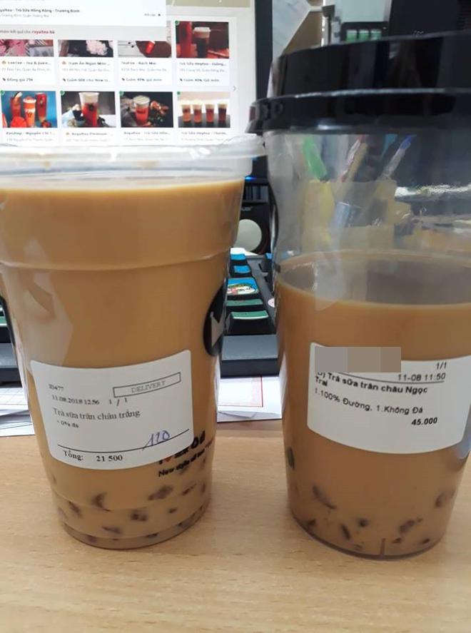 Mua tr&agrave; sữa kh&ocirc;ng đ&aacute; c&ugrave;ng 1 thương hiệu, c&ocirc; g&aacute;i nhận được 1 cốc đầy ắp, 1 cốc vơi như uống dở, d&acirc;n mạng c&atilde;i nhau ch&iacute; ch&oacute;e - Ảnh 4.