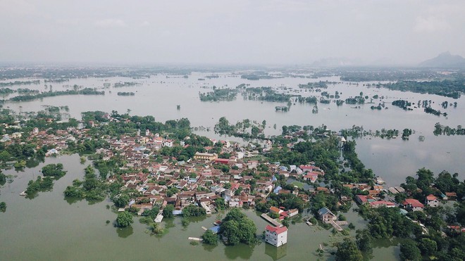 1 người lớn và 2 trẻ em sẩy chân đuối nước trong vùng ngập lụt ở Hà Nội - Ảnh 1.