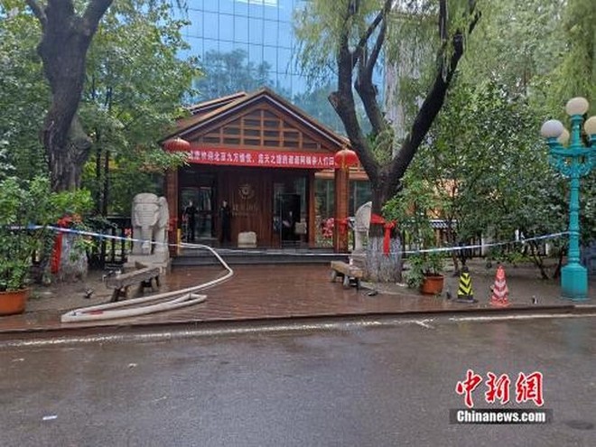 Hiện trường vụ cháy kinh hoàng tại khách sạn, 19 người chết ở Trung Quốc - Ảnh 13.