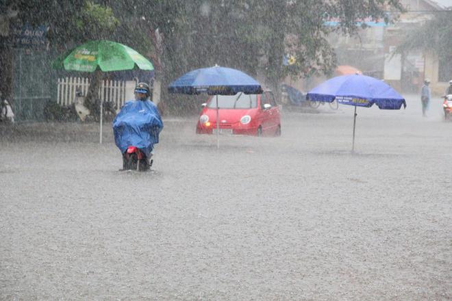 Miền Bắc mưa lớn tr&ecirc;n diện rộng, k&eacute;o d&agrave;i đến hết th&aacute;ng 8 - Ảnh 1.