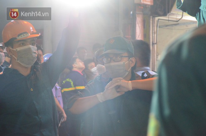 Ph&aacute;t hiện phần thi thể trong vụ ch&aacute;y d&atilde;y trọ cạnh viện nhi Trung ương - Ảnh 11.