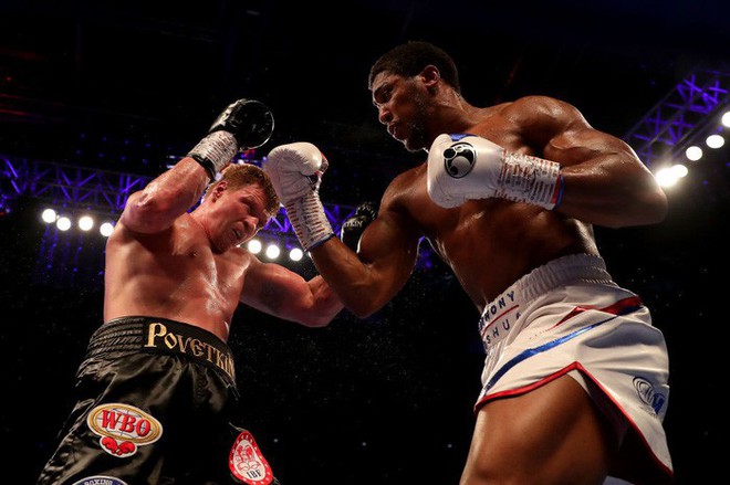 Hạ knock-out võ sĩ người Nga, Anthony Joshua bảo vệ thành công 4 đai thế giới - Ảnh 4.