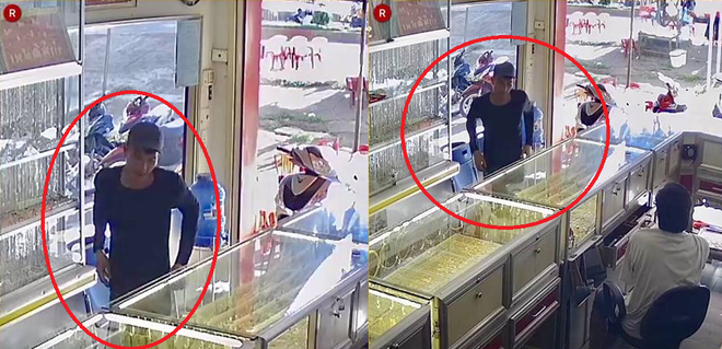 Clip: Nam thanh ni&ecirc;n giả vờ v&agrave;o mua v&agrave;ng rồi giật d&acirc;y chuyền bỏ chạy - Ảnh 1.