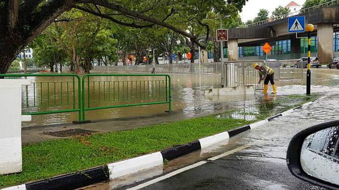 Châu Mỹ thì bão tuyết khủng khiếp, Úc đương đầu nắng nóng lịch sử còn Singapore cũng chịu cảnh lụt lội nghiêm trọng - Ảnh 7.