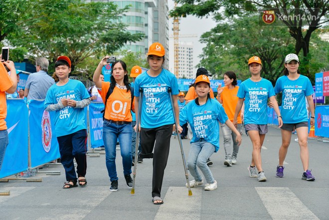 Đường đua 5km và câu chuyện vượt lên chính mình của những người khuyết tật ở Sài Gòn - Ảnh 1.