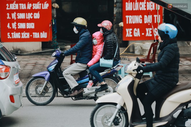 Người Hà Nội, Sài Gòn co ro trong ngày đầu đi làm sau kỳ nghỉ Tết Dương lịch 2019 - Ảnh 5.