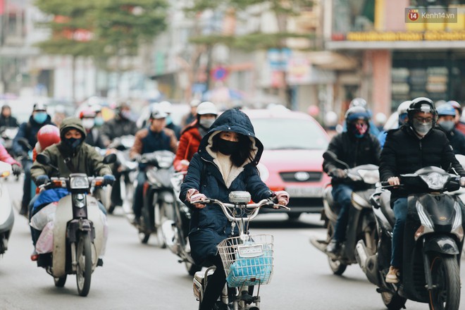 Người Hà Nội, Sài Gòn co ro trong ngày đầu đi làm sau kỳ nghỉ Tết Dương lịch 2019 - Ảnh 5.