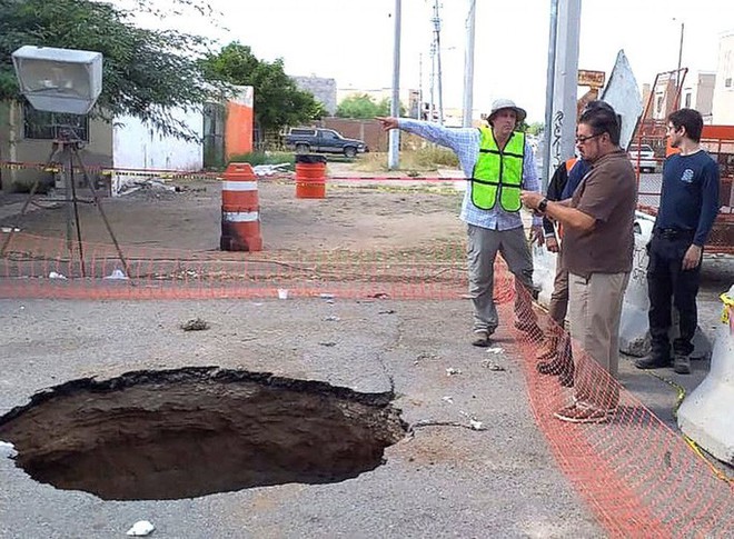 Ba thành phố cùng tìm một thanh niên mất tích trong cống ngầm - Ảnh 1.