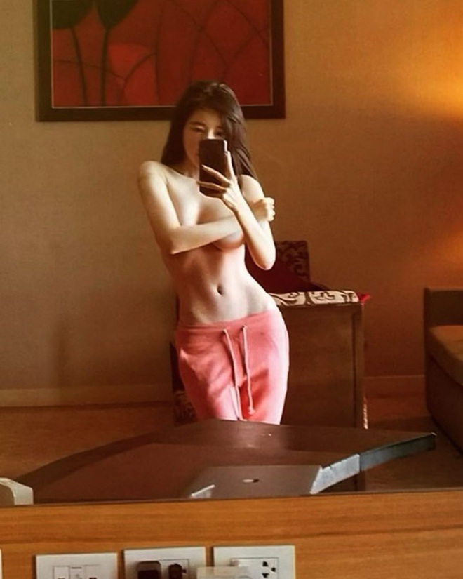 Ngắm ảnh của Elly Trần m&agrave; ai cũng phải đỏ mặt: Khoe eo thon chưa đủ, c&ograve;n v&eacute;n &aacute;o lộ v&ograve;ng 1 bốc lửa - Ảnh 3.