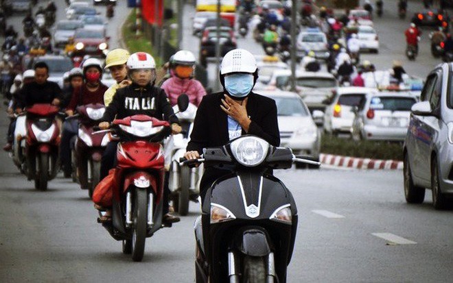 Không khí lạnh tràn về trong ngày đầu tiên đi làm sau nghỉ Tết, Hà Nội giảm nhiệt - Ảnh 1.