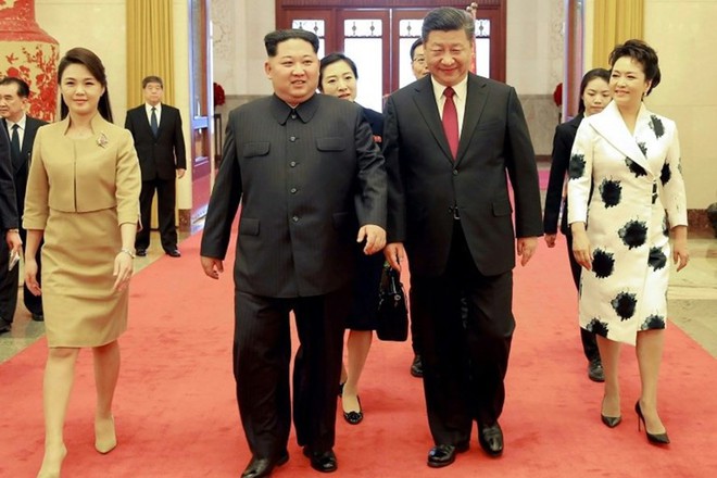 Bí mật ẩn sâu trong bộ trang phục kinh điển và kiểu tóc trứ danh của lãnh đạo Triều Tiên: Kim Jong-un