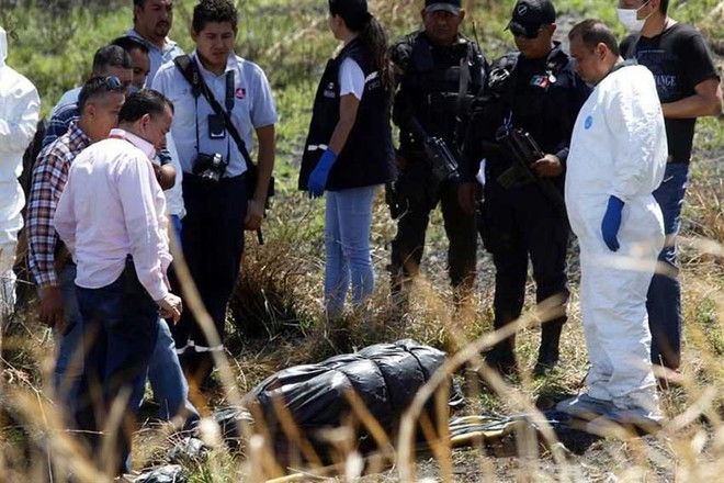 Mexico t&igrave;m thấy 19 thi thể dưới k&ecirc;nh tho&aacute;t nước  - Ảnh 1.