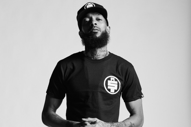 Nam rapper người Mỹ từng được để cử giải Grammy Nipsey Hussle tử vong trong một vụ xả súng tại Los Angeles - Ảnh 1.