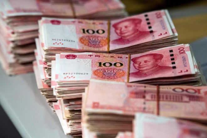 Tiền giả qu&aacute; giống thật, Trung Quốc khuyến c&aacute;o người d&acirc;n kh&ocirc;ng đốt v&agrave;ng m&atilde;  - Ảnh 1.
