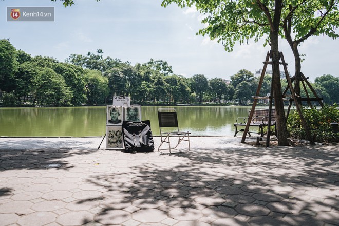 Chùm ảnh: Phố đi bộ hồ Gươm vắng bóng người trong ngày nắng nóng kinh hoàng ở Hà Nội - Ảnh 5.
