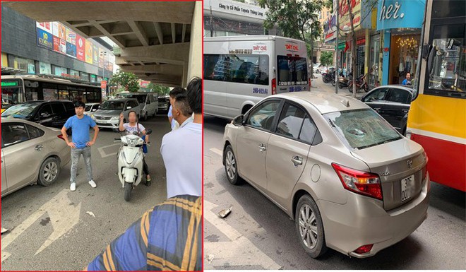 Sau va chạm giao th&ocirc;ng, người phụ nữ đi xe m&aacute;y cầm gạch n&eacute;m vỡ k&iacute;nh xe &ocirc; t&ocirc; - Ảnh 1.