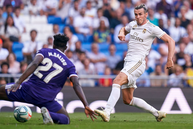 Benzema lập si&ecirc;u phẩm, Real Madrid vẫn đ&aacute;nh rơi chiến thắng ở ph&uacute;t cuối - Ảnh 2.