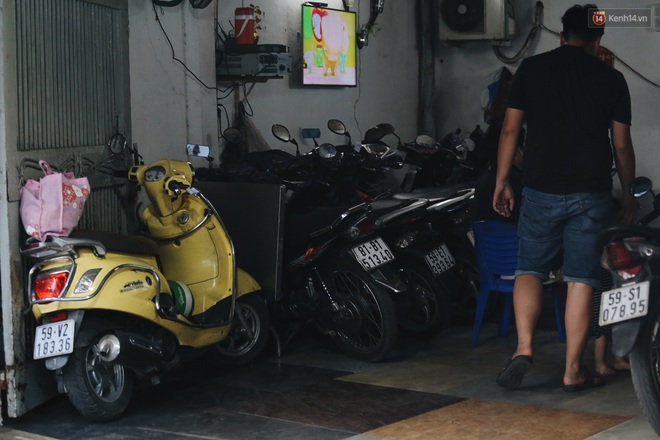 Dịch vụ giữ xe máy xuyên Tết cho người dân rời Sài Gòn về quê hốt tiền triệu mỗi ngày  - Ảnh 8.