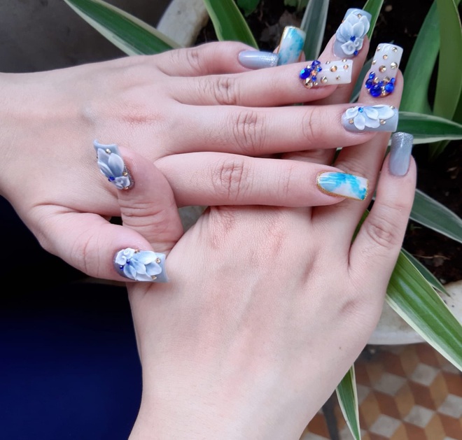 Chị em nô nức vào khoe bộ nail chơi Tết: Người làm đơn giản chỉ vài chục, người sương sương bộ móng hơn 700k - Ảnh 2.