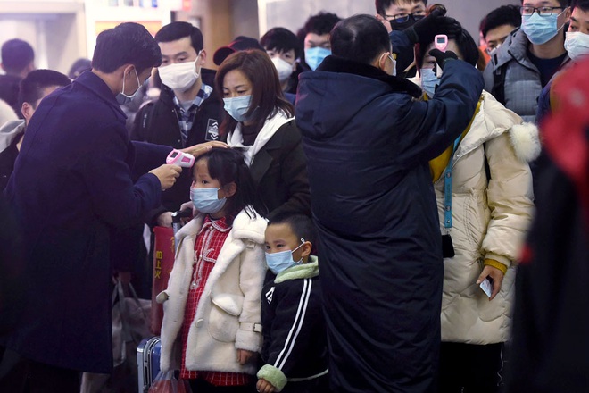 Trung Quốc bất ngờ tuyên bố không phải ai nhiễm Virus Corona cũng đều có dấu hiệu sốt - Ảnh 1.