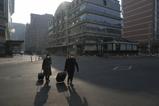 Nóng: Trung Quốc chính thức cấm người dân du lịch nước ngoài để ngăn chặn virus Vũ Hán lây lan - Ảnh 2.