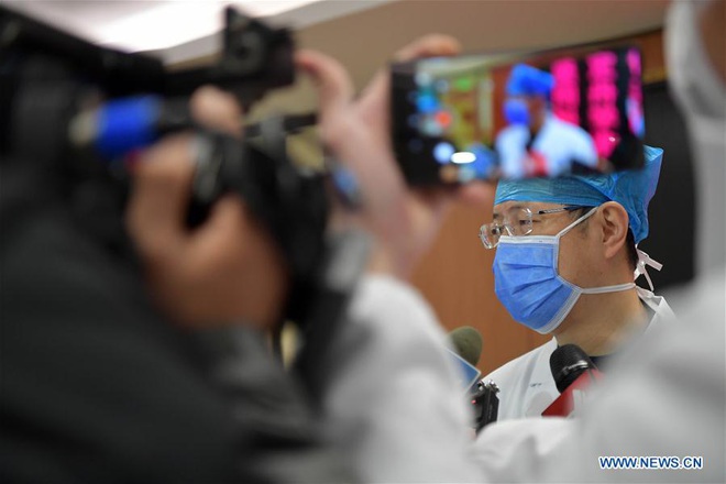 Trung Quốc: Bệnh nhân nhiễm virus corona đầu tiên xuất viện - Ảnh 7.