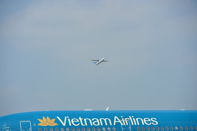 Vietnam Airlines triển khai chính sách hỗ trợ hành khách đến, đi từ Vinh, Huế, Đồng Hới - Ảnh 1.