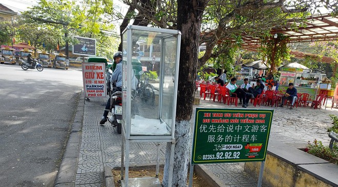 C&aacute;c cơ sở kinh doanh ở Hội An đồng loạt gỡ bảng từ chối kh&aacute;ch Trung Quốc - Ảnh 2.
