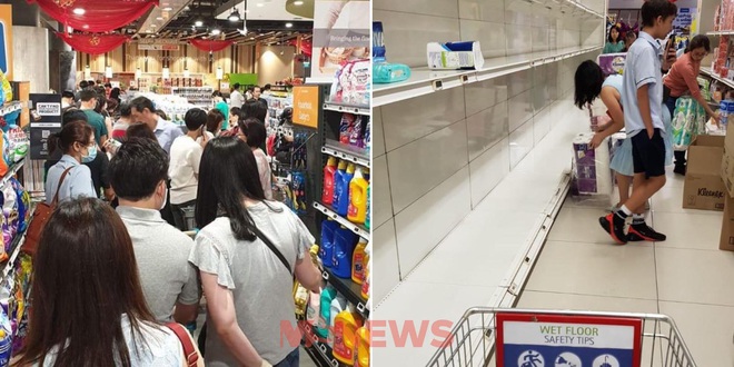 Singapore vừa nâng mức cảnh báo virus corona, người dân đã ùn ùn quét sạch nhu yếu phẩm tại hàng loạt siêu thị - Ảnh 6.