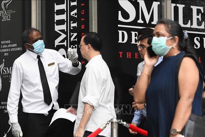 Singapore ghi nhận số ca nhiễm mới virus SARS-CoV-2 cao nhất trong một ngày - Ảnh 1.