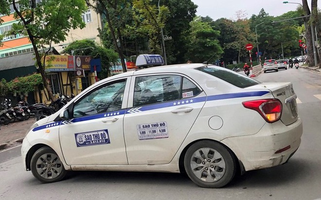 Nhiều taxi vẫn chống lệnh hạ cửa kính khi chạy trên đường - Ảnh 9.