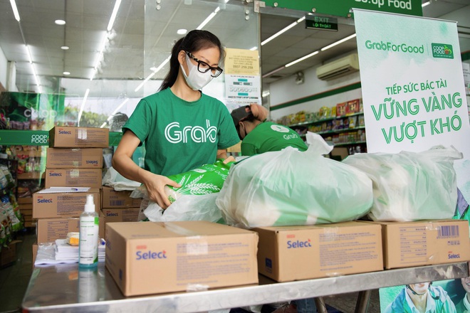 Món quà “tiếp sức tài xế Grab mùa dịch - Hơn cả lương thực, đó là sự tử tế của lòng người - Ảnh 1.