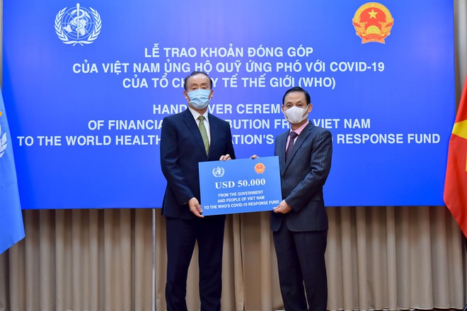 Việt Nam ủng hộ 50.000 USD cho quỹ ứng phó với Covid-19 của WHO  - Ảnh 1.
