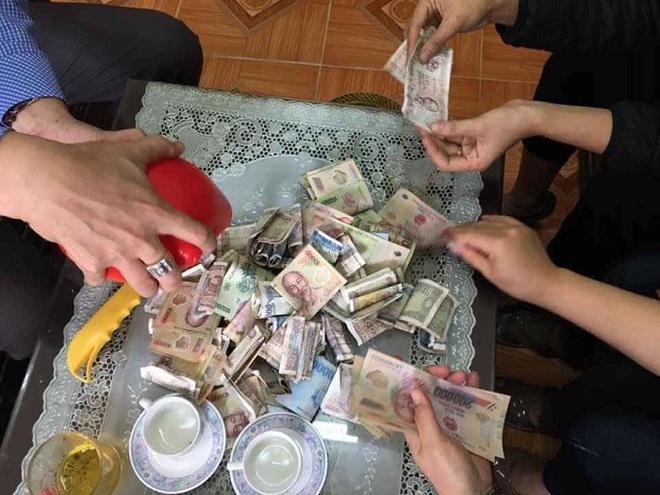 Học sinh lớp 2 đập lợn lấy tiền ủng hộ phòng chống COVID-19 - Ảnh 2.